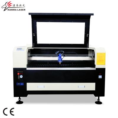 China Laser CUTTING widely used cnc lazer metal cutting mini+cardboard flat die cutter machine for sale