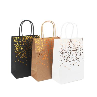 China Fancy Kraft Recyclable Luxury Glossy Shopping Paper Bags With Handles For Gifts for sale