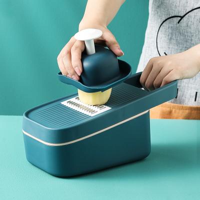 China Amazon Viable Hot Selling Cleaver Multifunctional Kitchen Household Potato Slice Vegetable Radish Grater for sale