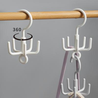 China Multi-clip claw slipper frame hook/five universal rotatable hook clothes and rotatable plastic hat racks for sale