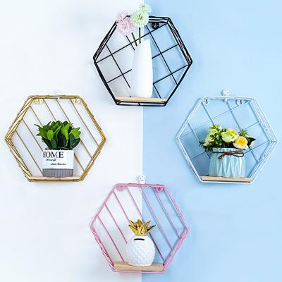 China Beautiful Twill Type Grid Twill Iron Wall Hanging Shelf Hexagonal Iron Crafts Wrought Iron for sale