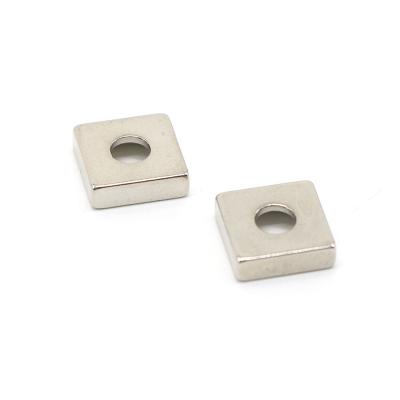 China Small industrial magnet neodymium ferrite block wholesale price magnet n42 magnet with hole for sale