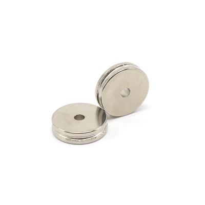 China Custom industrial magnet n48 milled ring neodymium magnets with hole for sale