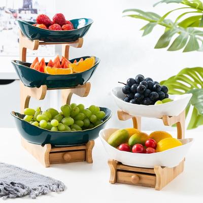 China Sustainable Nordic Ceramic Fruit Dish Living Room Household Two Three Layer Fruit Dish Tableware for sale