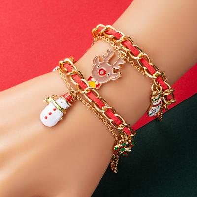 China Drop Shipping Fashion Christmas Tree Elk Elk Snowman Bangs Red Bow Dangle Women Christmas Bracelet for sale