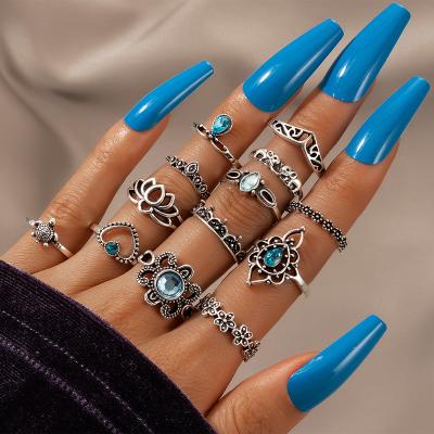 China 2022 BOHEMIA Ladies Spring Lotus Crown Diamond Peach Heart Elephant Ring 13 Pieces Set Multiple Rings Set Chunky Ring Set for sale