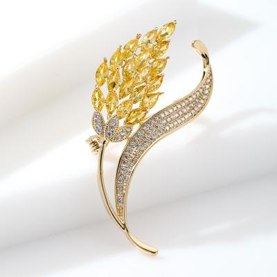 China Environmental Protection Copper + Personalized Zircon 2021 New Atmosphere Copper-plated Gold Zircon Wheat Micro Inlaid Corsage Factory Wholesale Customizable Brooch for sale