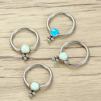 China ASTM F136 Titanium CBR 3 Beaded Captive Ring With Bezel Set Cabochon Opal for sale