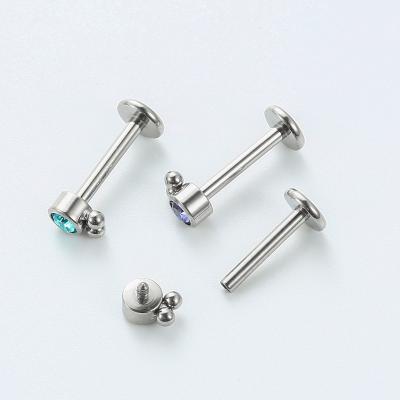 China ASTM F136 Titanium 2 Titanium Beaded Edge Internally Threaded Labret Design With Bezel Set CZ Gem Top for sale