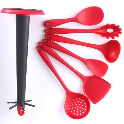 China Viable Hot Seller Wholesale Food Grade Silicone Kitchen Utensils Cookware Set With Hanging Rack for sale