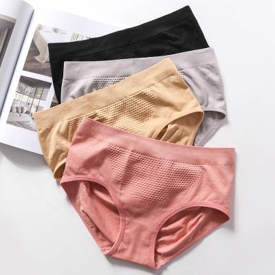 China Hot Selling Antibacterial 3D Honeycomb Seamless Underwear Women's Cotton Crotch Mid Waist Crotch Panties Seamless Belly Hip Lifting Briefs for sale