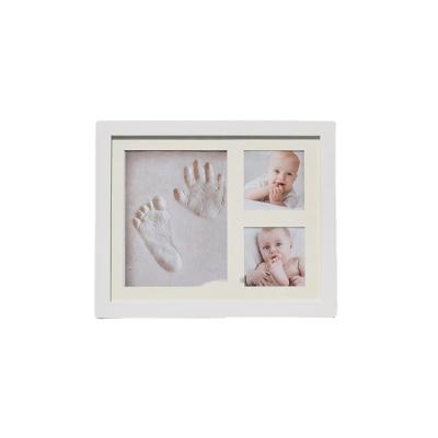 China Wholesale Wooden Newborn Baby Keepsake 12 Months Photo Kit With Handprint Photo Footprint Baby Frame for sale