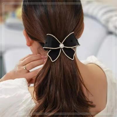 China Fashion High grade bow hair clip lady spring clip ponytail hair clip on top of the back of woman's head birthday gift for sale