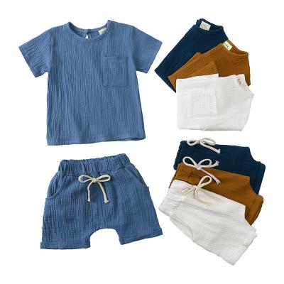 China Anti-Bacterial Wholesale OEM 100% Cotton Muslin Boy Toddler Clothes Sets Soft Short Sleeve T Shirt Short Set Two Piece Summer Baby Boy Clothing for sale