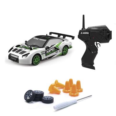 China Hot Sale RC Hobby 1:24 RC Drift Vehicle 15KM/H 4WD Radio Car High Speed ​​Racing Remote Control Toys With Lights For Kids Gift for sale