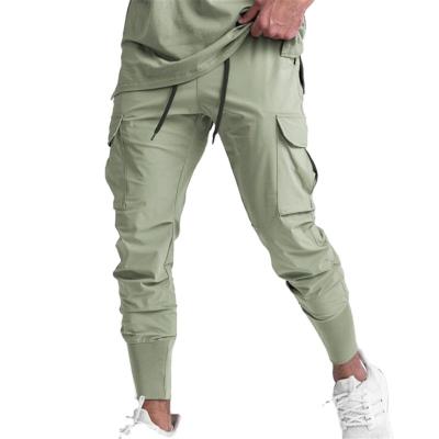 China Sportswear QUICK DRY Wholesale Customized Multi-Pocket Multifunctional Men's Work Streetwear Cargo Track Pants for sale