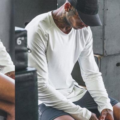 China Male Bodybuilding Mens Gyms Fitness Workout Tees Long Sleeve Man T Shirt Casual Skinny QUICK DRY Fashion T Shirt Tops Jogger Brand Clothing for sale