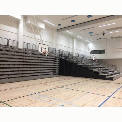 China Sports Venues Electric Telescopic Bleacher Indoor Seating Systems Wall Attached Unit For Multi-sport Venues for sale