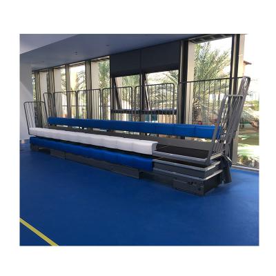 China Stadium Customized Sports Court Movable Bleacher Retractable Seating System With Blue And White Bench Seat for sale