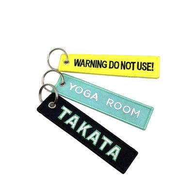 China Polyester / Twill Fabric Design Custom Key Ring Embroidered Fabric Promotional High Quality Keychains for sale