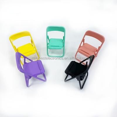 China Universal Mobile Phone Accessories Collapsible Foldable Chair Shape Mini Desk Phone Holder for sale