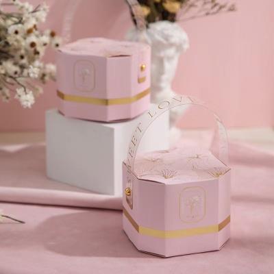 China Recycled Materials FUHING Logo Printed Pink Paper Gift Box Wedding Favor Present Boxes Small Wedding Candy Packaging Box With Plastic Handle for sale