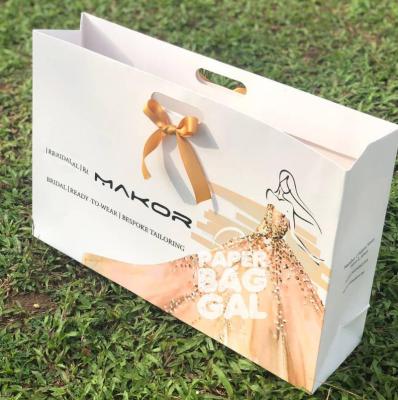 China FUHING Recyclable Custom Printed Gold Logo Printed Gift Paper Bag Luxury Recyclable Shopping Paper Bag With Ribbon Handles for sale