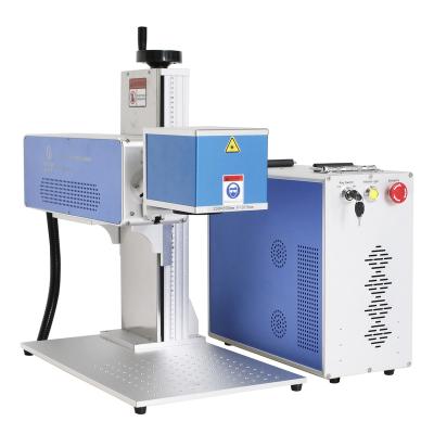 China Long Lifespan Portable 3D Fiber CO2 Laser Marking Machine 20w 30w 50w 100W For Plastic for sale