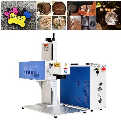 China 3D CO2 Metal Tube Laser Marking Machine For Leather /Wood/ Fabric Plastic Jeans Factory Price With Rotary Optional for sale