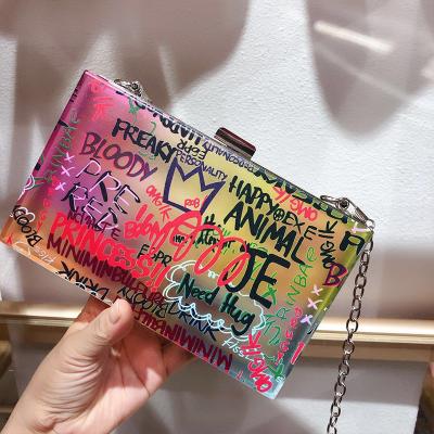 China Hot Selling Acrylic Ladies Fashionable Graffiti Clutch Handbag Evening Shoulder Bag Acrylic Cross - Body Clear Acrylic Purse for sale