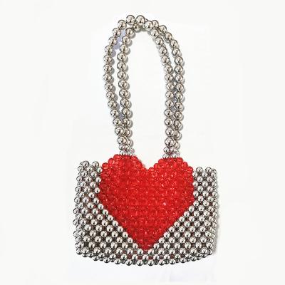 China Top Quality Fashion Girls Heart Pattern Pearl Handbag Ladies Acrylic Pearl Beaded Shoulder Clutch Bag for sale