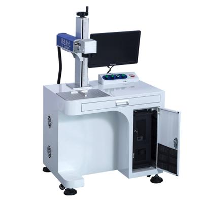 China Air-cooled desktop fiber laser marking machine 20w 30w 50w 60w 70w for metal jewelry inside ring with rotary laser marking machines for sale