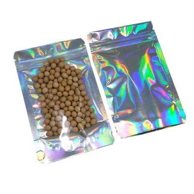 China Multi-application High Quality Food Grade 100Pcs Stand Up Clear Laser Aluminum Foil Zipper Lock Storage Bag Zipper Packaging for sale