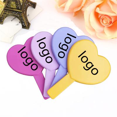 China SPA Double Sided Handheld Salon Vanity Makeup Gold Heart Shape Portable Vanity With Handle Mirror Handheld Cosmetic Mirrors For Women for sale