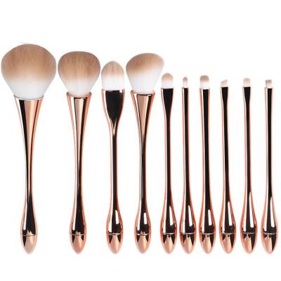 China Comfortable Luxurious Rose Gold 10 PCs Bling Face Makeup Powder Brush Set Woman Base Makeup Comfortable Makeup Brush for sale