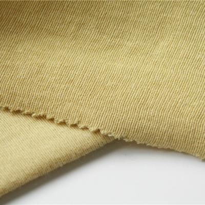 China Gewebe-rohes Gelb 300gsm 100% Para Aramid für geschnittene Antihandschuhe zu verkaufen