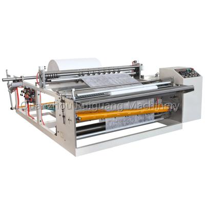 China Hotels Wet Wet Type Non Woven Rags Canister Roll Type Rags Rewinding Machine for sale