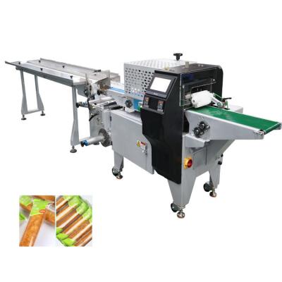 China Automatic Mango Dried Pillow Packaging Machine Bread Cake Flow Pack Machine zu verkaufen