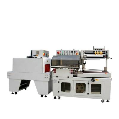 China Full Automatic Food Cardboard Shrink Packaging Film Shrink Wrap Machine for sale