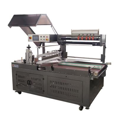 China UBF-450A Automatic Continuous Side Sealer Starburst Wrapping Shrink Paper Wrapping Machine for sale