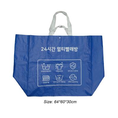 China Heavy Duty Reclycled PP Woven Oversize Laundry Supermarket Shopping Bags With Shoulder Strap for sale