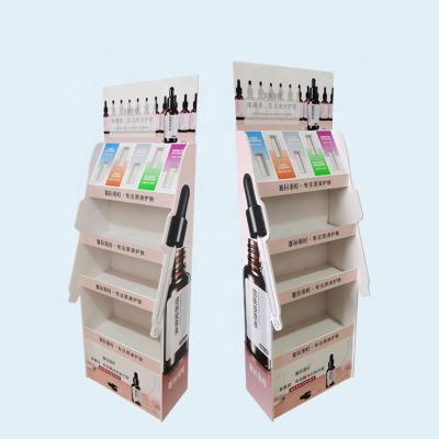 China Customized Corrugated Single Sided Cardboard Makeup Display Stand Cosmetic Countertops Product Lipstick Eyelash Display Rack for sale