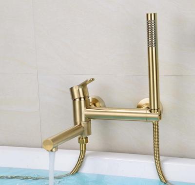 China Metered Hot Cold Copper Tub Faucets Gold Swivel Bathtub Wall Mounted Faucet With Hand Shower for sale