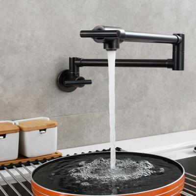 China Hot Cold Swing Arm Two Joint Kitchen Faucet Wall Mount Double Handle Matte Black Pot Filler for sale