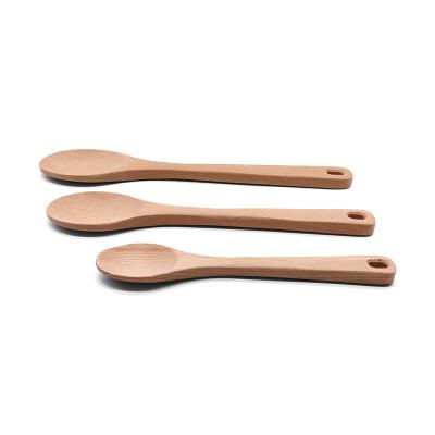 China Good viable hand feeling beech wood spoon with a hole on the handle for sale