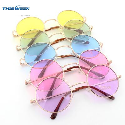 China Around 2022 Fashion Trends Harajuku Style Fluorescent Color Metal Frame Round Sunglasses For Men Women Girls for sale