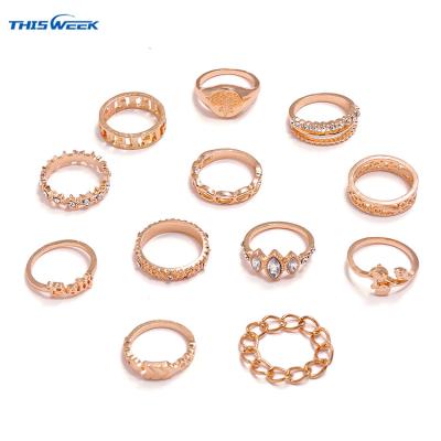 China Simplicity Fashion Luxury Twelve-Piece Set Carved Tulip Chain Arrows Eternity Rings for sale