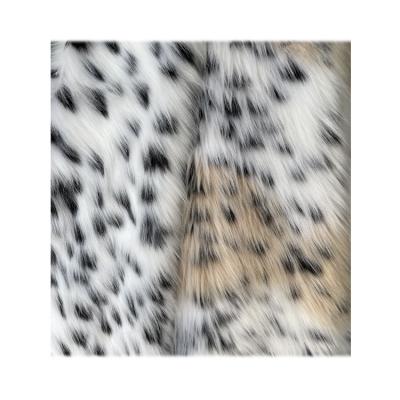 China Auto upholstery fashion long pile faux plush fox fur fabric white leopard printed artificial textile for women garment for sale