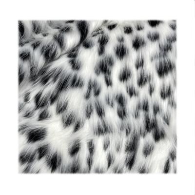 China New auto upholstery launch fancy stock faux fur fabric fox leopard jacquard printed long pile plush for women garment carpet for sale