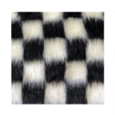 China Black White Auto Pattern Plush Checkered Jacquard Fashion Upholstery Faux Fox Fur Fabric For Garment for sale